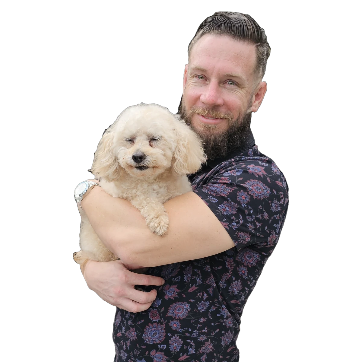Alec holding a cream poodle
